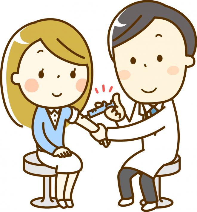 女性が予防接種を受けている画像